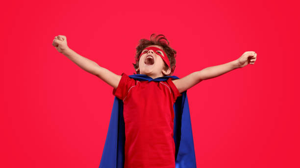 istock Excited superhero screaming and looking up 1169656469
