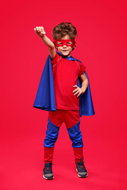 istock Little superhero in heroic pose 1169656482