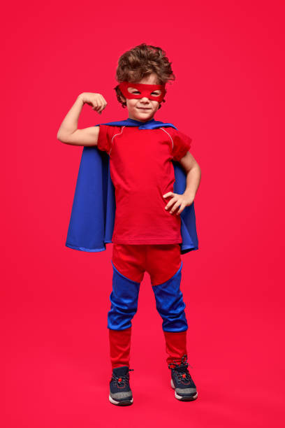 istock Little superhero showing arm muscles 1169656494