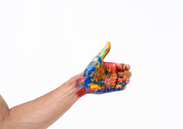 istock Man hand in colorful on white background 1169664083