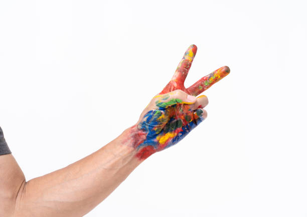istock Man hand in colorful on white background 1169664094