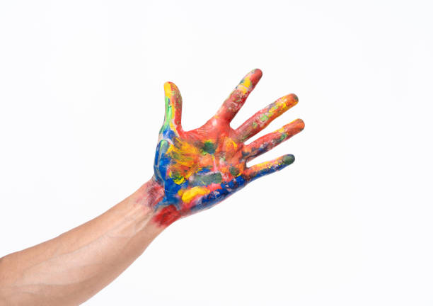istock Man hand in colorful on white background 1169664189