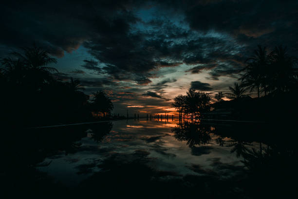 istock Morning sunrise at da nang beach with reflection, Vietnam 1169664993