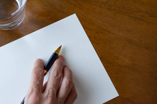 istock Letter letter paper and ballpoint pen 1169665753