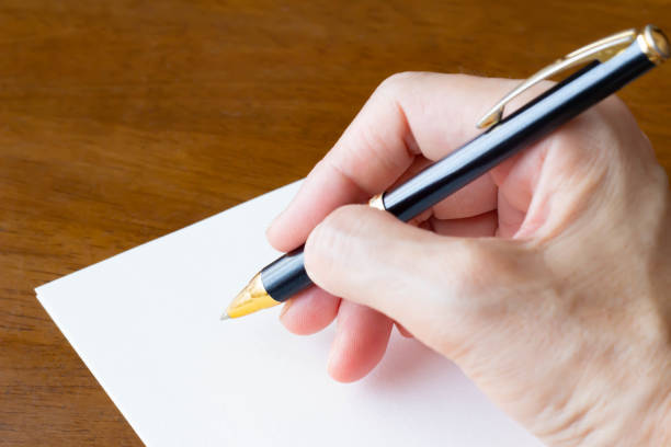 istock Letter letter paper and ballpoint pen 1169665759