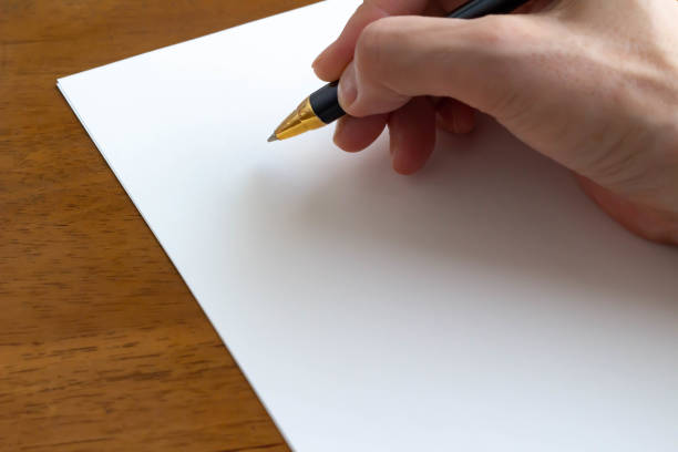 istock Letter letter paper and ballpoint pen 1169665762