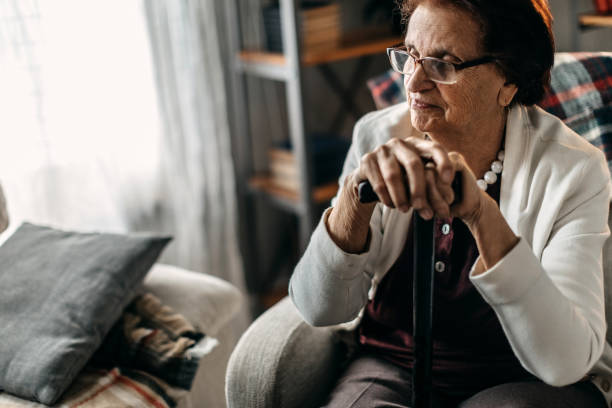 istock Old woman sitting alone 1169667308