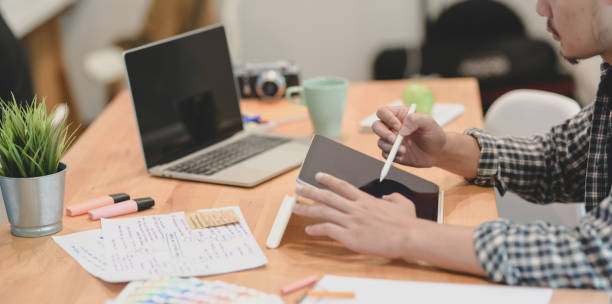 istock Cropped view of young designer planing his project 1169673935
