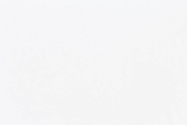 istock Abstract closeup white fabric texture background 1169674725