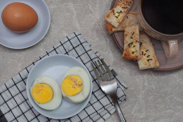 istock breakfast menu with slices of bread, eggs and coffee 1169675155