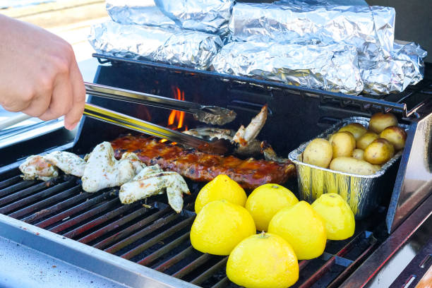 Various foods on the barbecue grill at the party