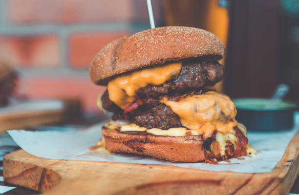 istock Double Meat Burger. delicious gourmet burger with cheese and bacon 1169677679