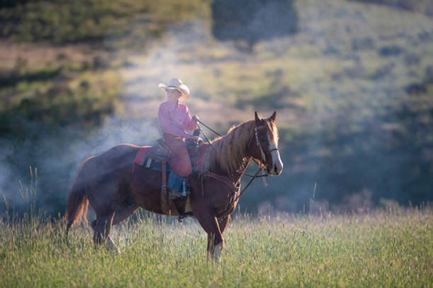 istock Little cowboy horseback riding 1169686838