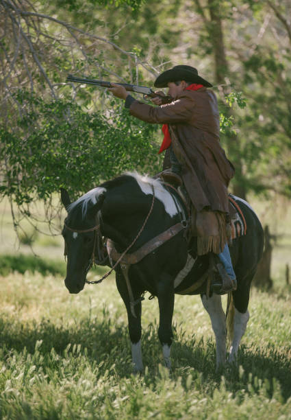 istock Cowboy sheriff with paint horse 1169688765