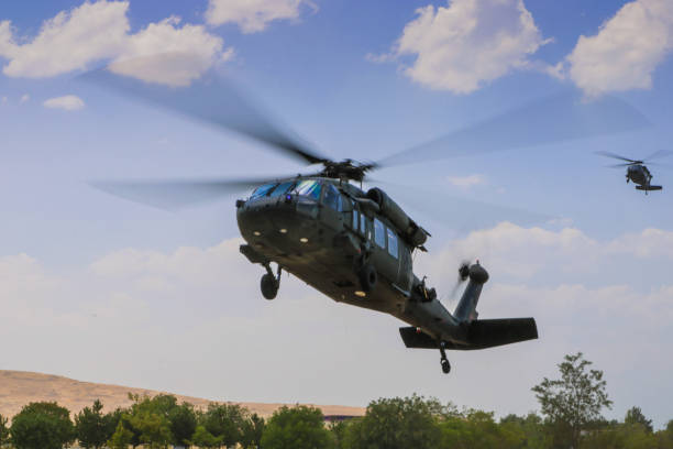 istock military utility helicopter in flight 1169689968