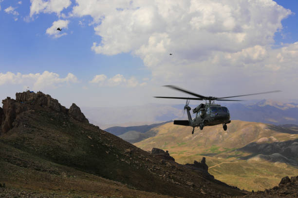 istock military utility helicopter in flight 1169689986