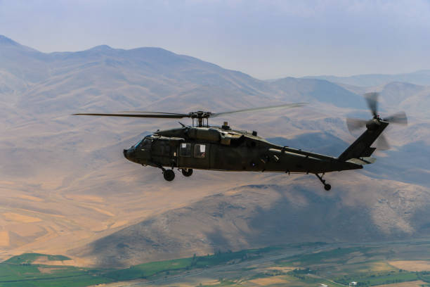 istock UH-60 Military Utility Helicopter in flight 1169690059