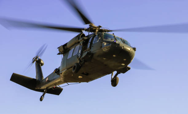 istock UH-60 Military Utility Helicopter in flight 1169690066