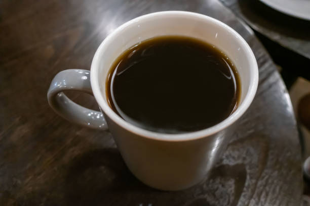 istock Coffee mug in a coffee shop 1169691146