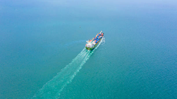 istock Container Ship Vessel Cargo Carrier. import export logistic and export products worldwide 1169693234