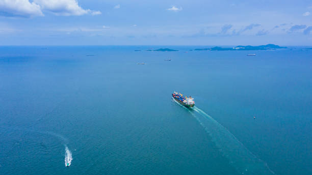 istock Container Ship Vessel Cargo Carrier. import export logistic and export products worldwide 1169693236