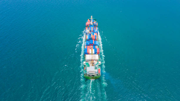 istock Container Ship Vessel Cargo Carrier. import export logistic and export products worldwide 1169693271