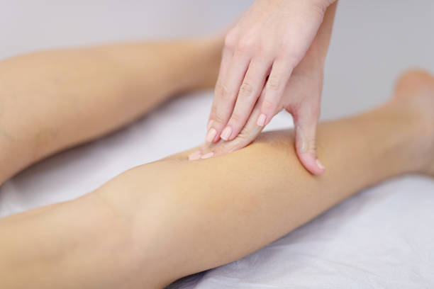 istock Treating calf muscle with massage 1169694736