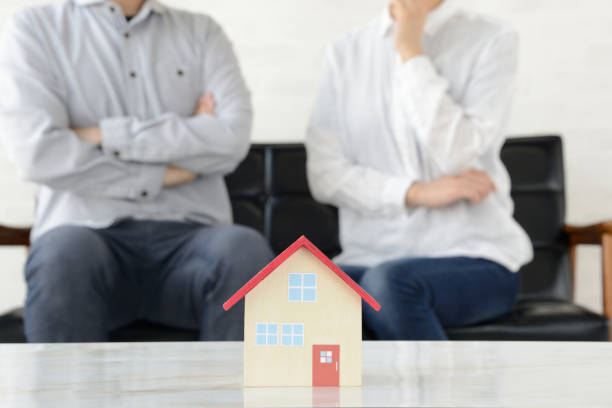 Man and woman talking about housing problems