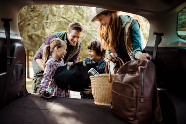 verpackung - family four people smiling autumn stock-fotos und bilder