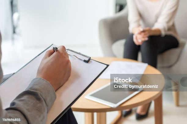 Psychologist Understanding Problems Of A Woman Patient Stock Photo - Download Image Now