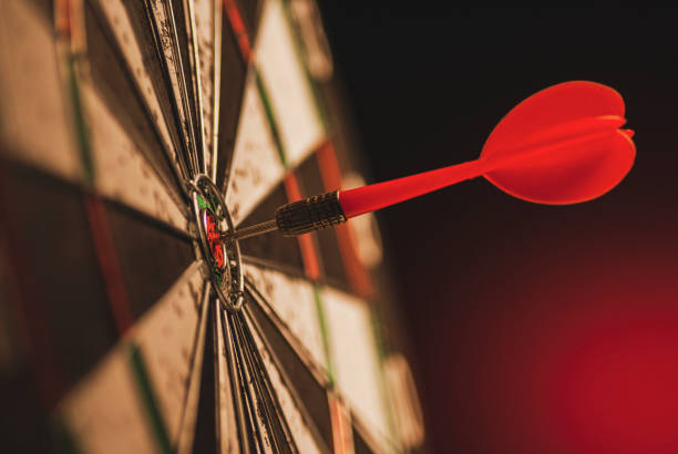 istock Successful bulls eye centre dart on a target 1169698702