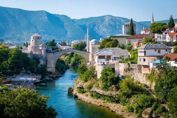 The typical postcard of Mostar. The historic bridge was destroyed during the war.