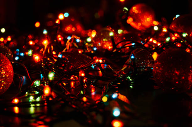 istock Horizontal bright Christmas garlands and Christmas decorations. Background bright rich color composition design concept 1169713451