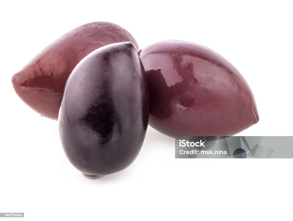Purple Kalamata olives isolated on white background Kalamata Olive Stock Photo