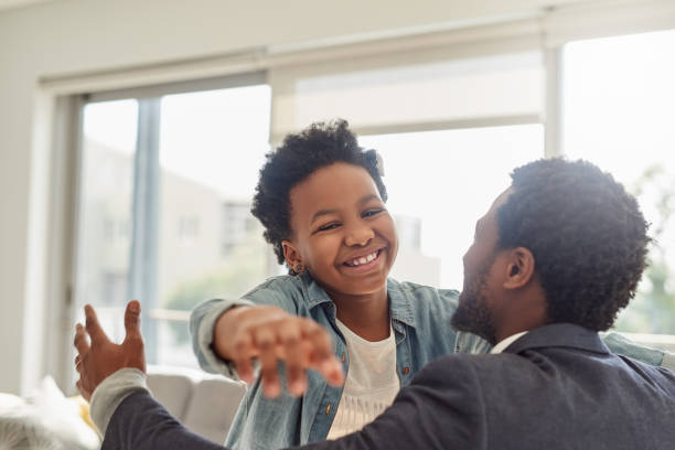 istock And she runs to hug her dad 1169716533