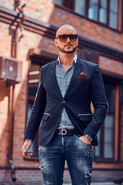 istock Attractive businesman is posing for photographer 1169717474