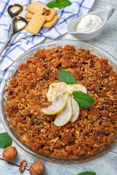 istock Pear crumble with a sprig of mint. 1169718776