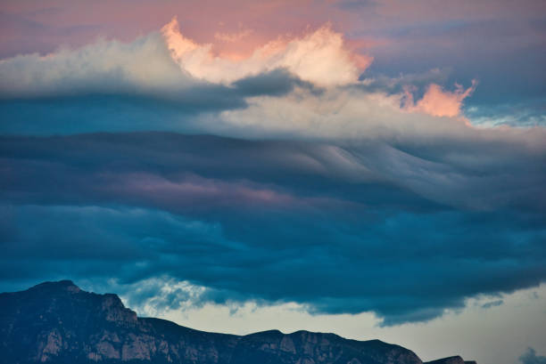 Serene landscape of clouds and mountains in Romania, colorful shot