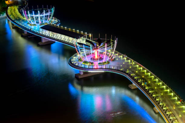istock Colorful night walking bridge in Can Tho, Vietnam 1169719883