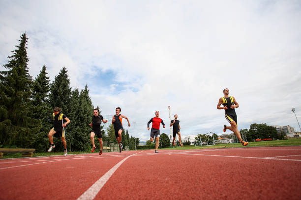 istock Athlets sprinting at finish line 1169720886