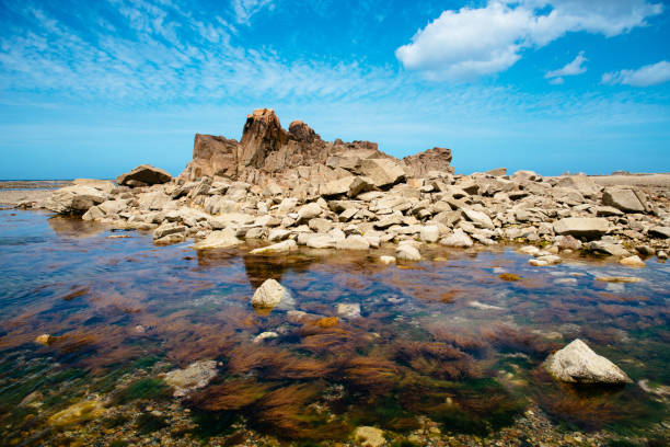 Rock formation against sky in Sillon de Talbert area in Brittany, France