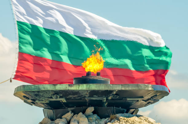 Eternal fire burns against the backdrop of the National Flag of Bulgaria. The Shipka Freedom Monument, Gabrovo, Bulgaria. Dedicated to the Battle of Shipka Peak (August 1877) Eternal fire burns against the backdrop of the National Flag of Bulgaria. The Shipka Freedom Monument, Gabrovo, Bulgaria. Dedicated to the Battle of Shipka Peak (August 1877) russian military photos stock pictures, royalty-free photos & images