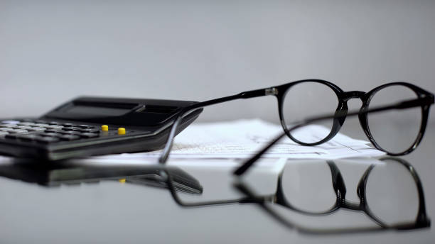 istock Glasses better vision lying on business person table, poor eyesight, exhaustion 1169729019