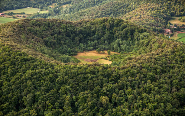 aerial view of santa margarita volcano in la Garrotxa, Girona province, Catalonia, Spain aerial view of santa margarita volcano in la Garrotxa, Girona province, Catalonia, Spain extinct volcano stock pictures, royalty-free photos & images