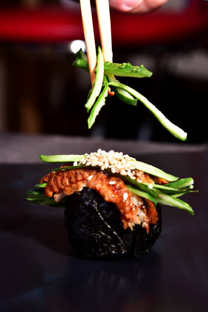 istock Sushi ball close-up on a dark background 1169730052