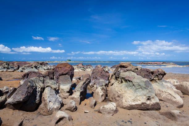 istock Rock formations at beach in tip of Borneo 1169734941