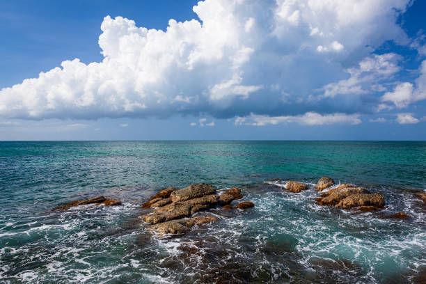 istock Rock formations at beach in tip of Borneo 1169734942