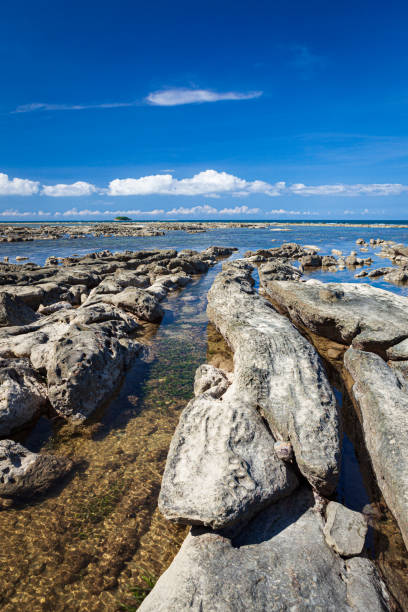 istock Rock formations at beach in tip of Borneo 1169735000