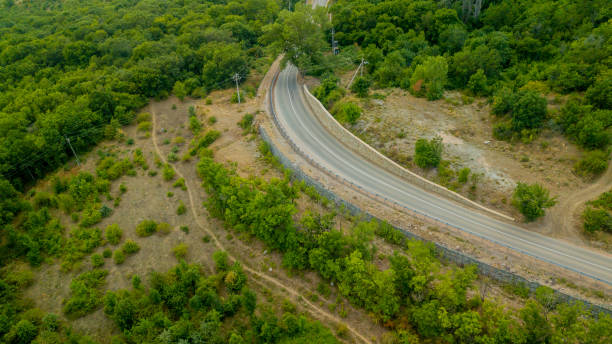istock Crimea trip: view from drone of curvy mountain road 1169741262