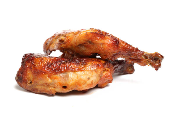 istock grilled chicken leg  on white background 1169741755